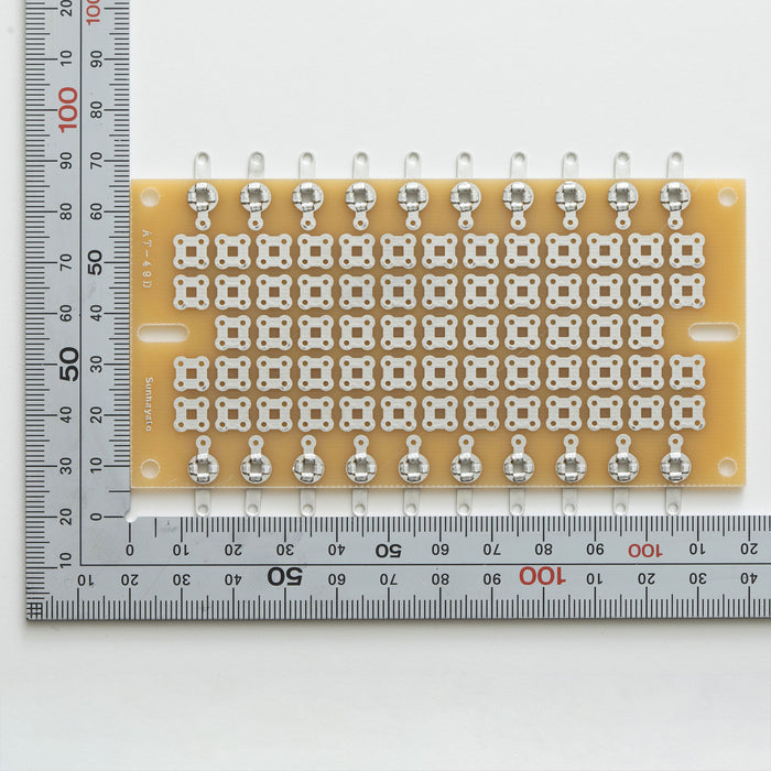 写真：※在庫限り※ラグ端子付きユニバーサル基板（ガラスコンポジット片面／60.96×119.38×1.6t）（AT-49D）：はんだ面