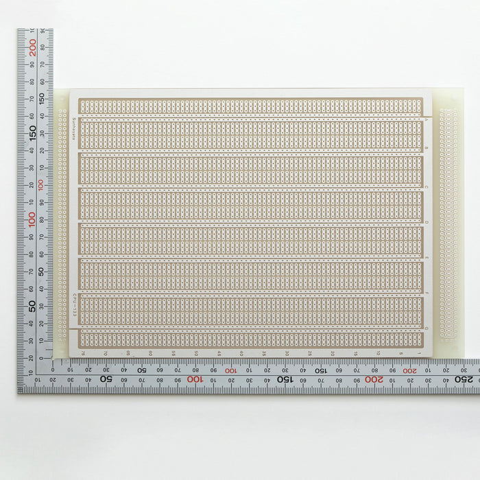 写真：ユニバーサル基板（ガラスエポキシ片面／156×230×1.6t）（CPU-133）：はんだ面