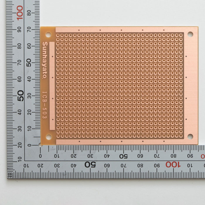 写真：小型ユニバーサル基板（紙フェノール片面／95×72×1.6t）（ICB-503）：はんだ面