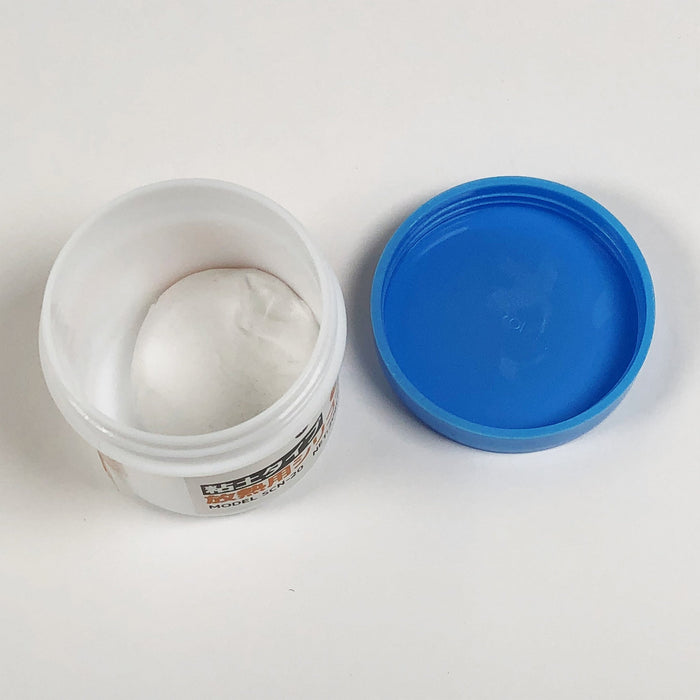 写真：粘土タイプ放熱用シリコーン（SCN-20）：キャップを外した状態