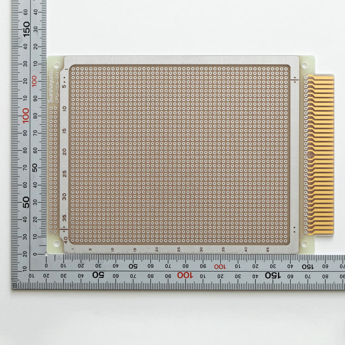 写真：端子付きユニバーサル基板（ガラスエポキシ両面／115×165×1.6t）（CPU-110ADOT）：はんだ面