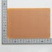 写真：ユニバーサル基板（紙フェノール片面／115×160×1.6t）（ICB-019）：はんだ面