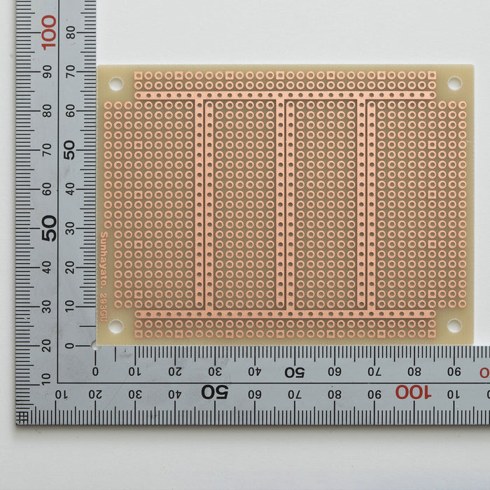 写真：小型ユニバーサル基板（ガラスコンポジット片面／72×95×1.2t）（ICB-293GU）：はんだ面