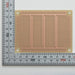 写真：小型ユニバーサル基板（ガラスコンポジット片面／72×95×1.2t）（ICB-293GU）：はんだ面