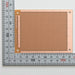 写真：小型ユニバーサル基板（紙フェノール片面／95×72×1.6t）（ICB-503）：はんだ面