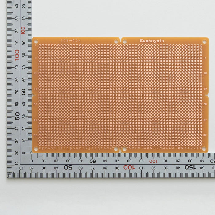 写真：ユニバーサル基板（紙フェノール片面／95×145×1.6t）（ICB-504）：はんだ面