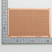 写真：ユニバーサル基板（紙フェノール片面／95×138×1.6t）（ICB-505）：はんだ面