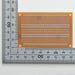 写真：小型ユニバーサル基板（紙フェノール片面／47×72×1.6t）（ICB-86）：部品面