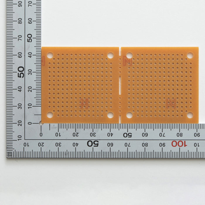 写真：小型ユニバーサル基板（紙フェノール片面／45×91×1.6t）（ICB-90）：部品面