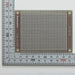写真：小型ユニバーサル基板（ガラスエポキシ両面／72×95×1.6t）（ICB-93SEG）：はんだ面
