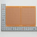 写真：小型ユニバーサル基板（紙フェノール片面／95×138×1.6t）（ICB-93W）：はんだ面