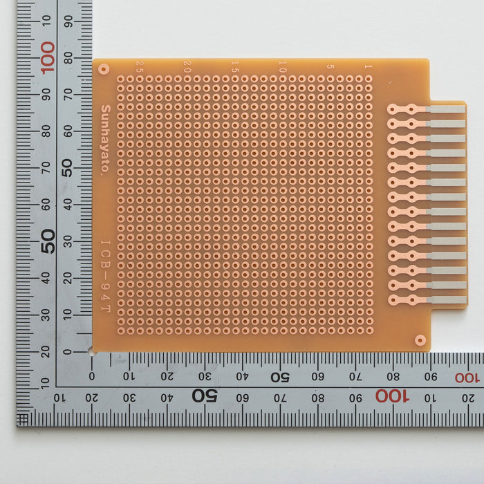 写真：端子付きユニバーサル基板（紙フェノール片面／80×100×1.6t）（ICB-94T）：はんだ面