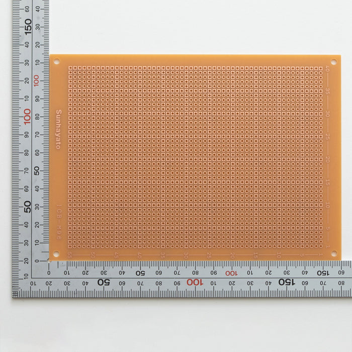 写真：ユニバーサル基板（紙フェノール片面／160×115×1.6t）（ICB-M96）：はんだ面