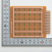 写真：端子付きユニバーサル基板（紙フェノール両面／80×100×1.6t）（UK-14P-5M(70)）：部品面